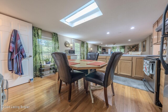 3085 Centerview Rough River Ln, Hudson, KY 40145 - dining space featuring light wood-type flooring, a skylight, plenty of natural light, and recessed lighting