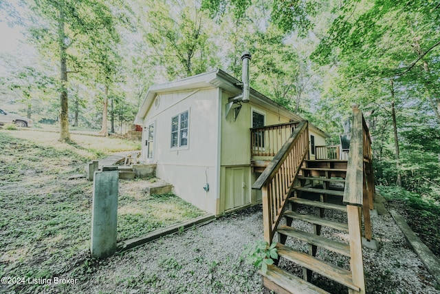 3085 Centerview Rough River Ln, Hudson, KY 40145 - view of property exterior featuring stairway and a wooden deck