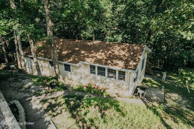 3085 Centerview Rough River Ln, Hudson, KY 40145 - view of front facade featuring roof with shingles and stucco siding