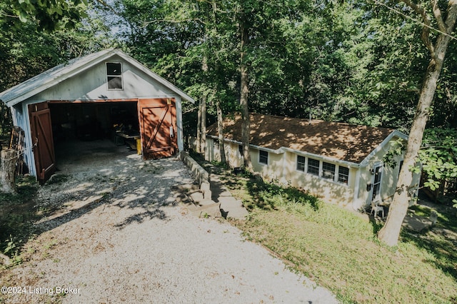 3085 Centerview Rough River Ln, Hudson, KY 40145 - view of front of house featuring a garage and an outbuilding