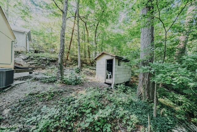3085 Centerview Rough River Ln, Hudson, KY 40145 - view of yard with a shed and a view of trees