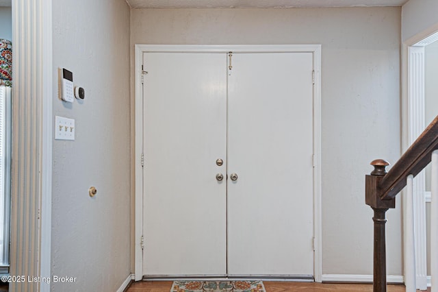 3904 Bayonne Ct, Jeffersontown, KY 40299 - foyer entrance featuring baseboards and light wood finished floors