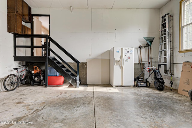 3904 Bayonne Ct, Jeffersontown, KY 40299 - garage with white refrigerator with ice dispenser