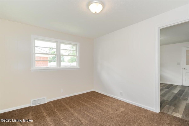 6100 Jessamine Ln, Louisville, KY 40258 - spare room with dark carpet and baseboards