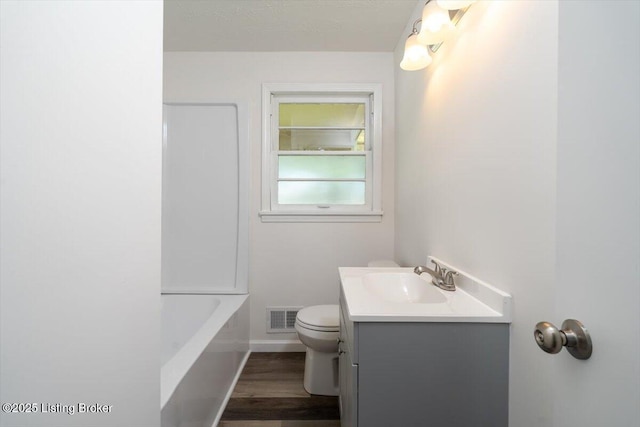 6100 Jessamine Ln, Louisville, KY 40258 - full bathroom featuring vanity, toilet, baseboards, and wood finished floors
