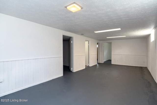 6100 Jessamine Ln, Louisville, KY 40258 - basement with wainscoting and a textured ceiling