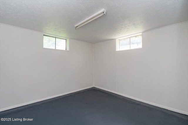 6100 Jessamine Ln, Louisville, KY 40258 - basement featuring a textured ceiling and baseboards