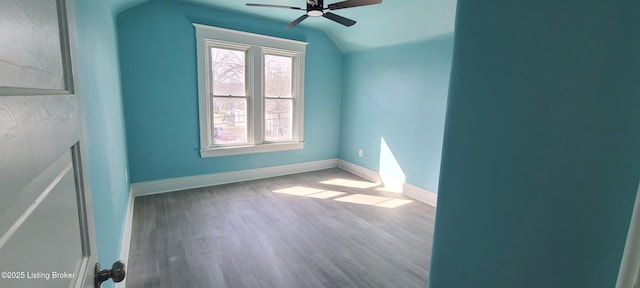 1033 Lynnhurst Ave, Louisville, KY 40215 - spare room with a ceiling fan, lofted ceiling, wood finished floors, and baseboards