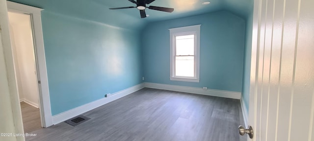 1033 Lynnhurst Ave, Louisville, KY 40215 - empty room with ceiling fan, vaulted ceiling, baseboards, and wood finished floors