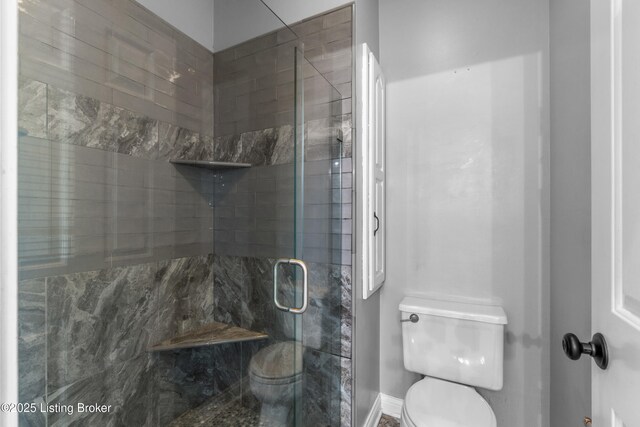 916 Winchester Blvd, Elizabethtown, KY 42701 - bathroom with toilet, a shower stall, and baseboards