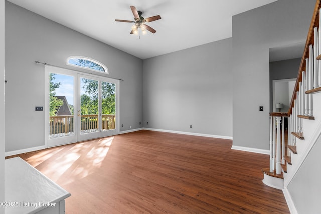 916 Winchester Blvd, Elizabethtown, KY 42701 - unfurnished room featuring a ceiling fan, wood finished floors, stairs, and baseboards