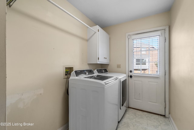916 Winchester Blvd, Elizabethtown, KY 42701 - washroom featuring independent washer and dryer, cabinet space, baseboards, and light marble finish floors