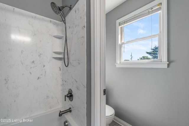 916 Winchester Blvd, Elizabethtown, KY 42701 - bathroom featuring washtub / shower combination, toilet, and baseboards
