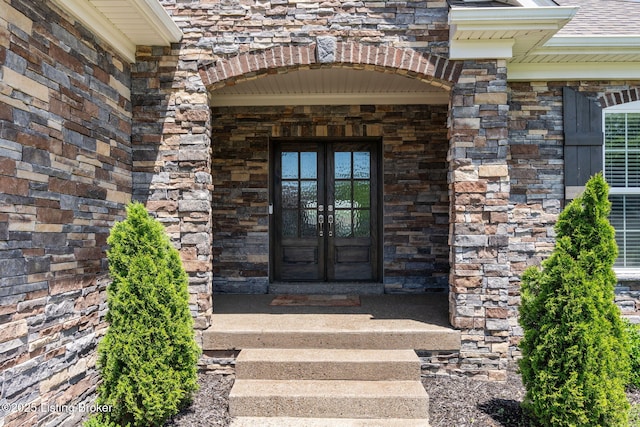 15905 Cabin View Ln, Louisville, KY 40245 - property entrance featuring french doors, brick siding, and roof with shingles