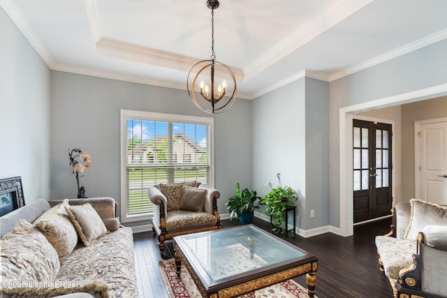 15905 Cabin View Ln, Louisville, KY 40245 - living room with dark wood finished floors, a chandelier, ornamental molding, baseboards, and a tray ceiling
