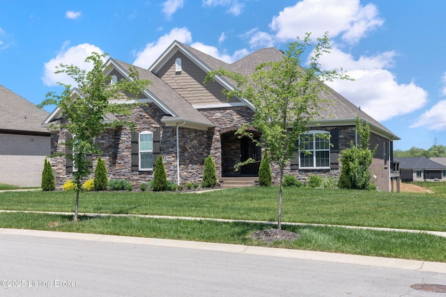 15905 Cabin View Ln, Louisville, KY 40245 - craftsman-style home featuring stone siding and a front yard