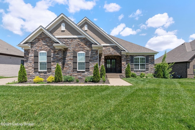 15905 Cabin View Ln, Louisville, KY 40245 - craftsman-style house featuring stone siding, a front lawn, and french doors