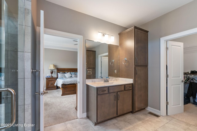 15905 Cabin View Ln, Louisville, KY 40245 - full bath with vanity, a spacious closet, ensuite bath, baseboards, and tile patterned floors