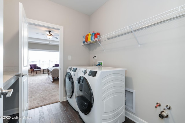 15905 Cabin View Ln, Louisville, KY 40245 - washroom featuring separate washer and dryer, dark wood finished floors, baseboards, and ceiling fan