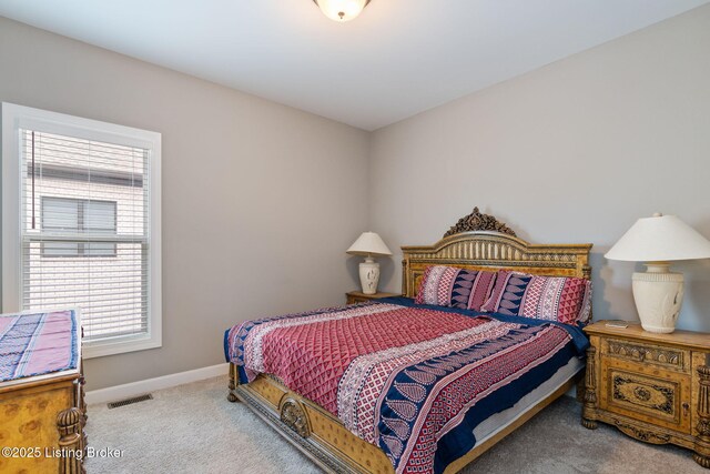 15905 Cabin View Ln, Louisville, KY 40245 - carpeted bedroom with multiple windows and baseboards