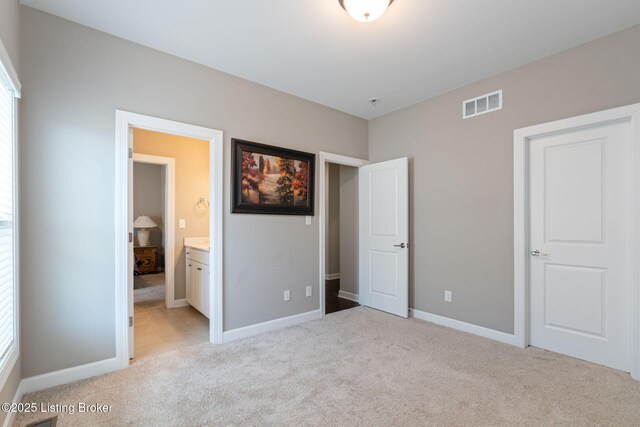 15905 Cabin View Ln, Louisville, KY 40245 - unfurnished bedroom featuring light colored carpet, baseboards, and connected bathroom
