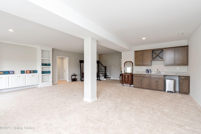 15905 Cabin View Ln, Louisville, KY 40245 - kitchen with light carpet, a sink, baseboards, light countertops, and recessed lighting