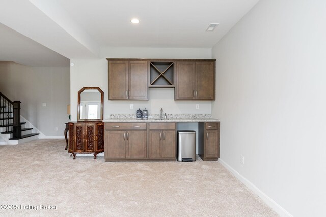 15905 Cabin View Ln, Louisville, KY 40245 - kitchen featuring light carpet, baseboards, a sink, and recessed lighting