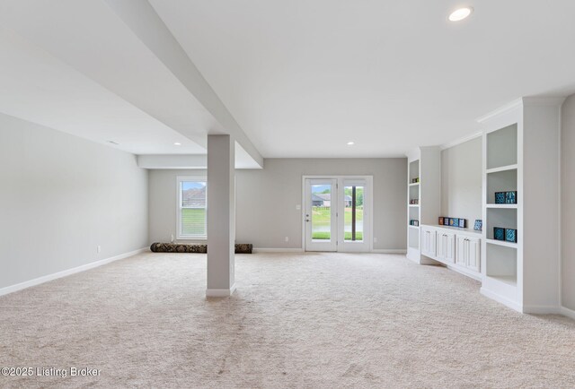 15905 Cabin View Ln, Louisville, KY 40245 - unfurnished living room featuring light carpet, recessed lighting, healthy amount of natural light, and baseboards