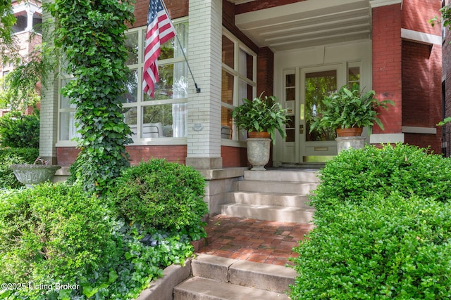 1204 S 2nd St Unit 1, Louisville, KY 40203 - doorway to property featuring brick siding and a porch