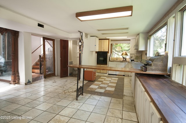 357 Ridgeway Ave, Louisville, KY 40207 - kitchen featuring wood counters and dishwasher
