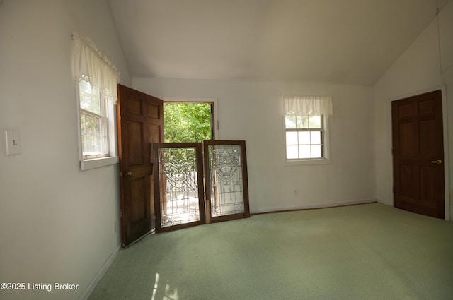 357 Ridgeway Ave, Louisville, KY 40207 - unfurnished room featuring lofted ceiling, healthy amount of natural light, light carpet, and baseboards