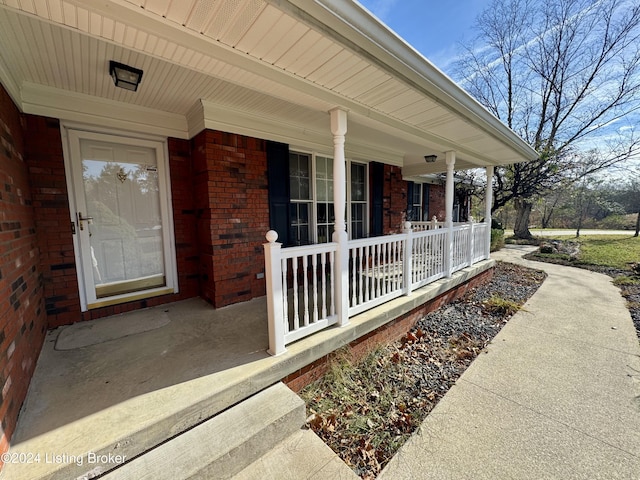 11569 New Haven Rd, New Haven, KY 40051 - doorway to property with covered porch and brick siding