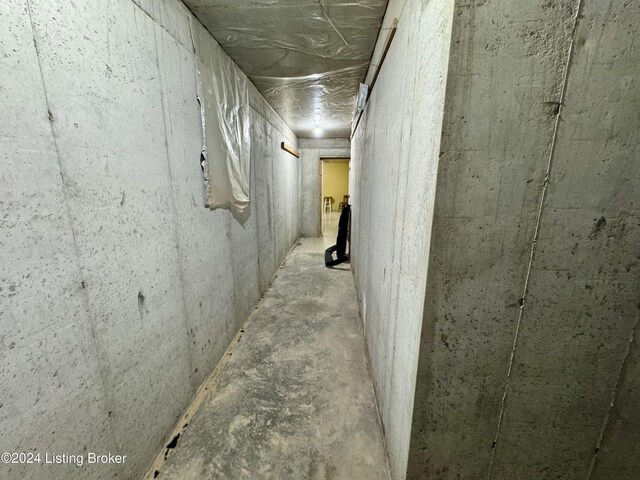 11569 New Haven Rd, New Haven, KY 40051 - hallway featuring unfinished concrete flooring