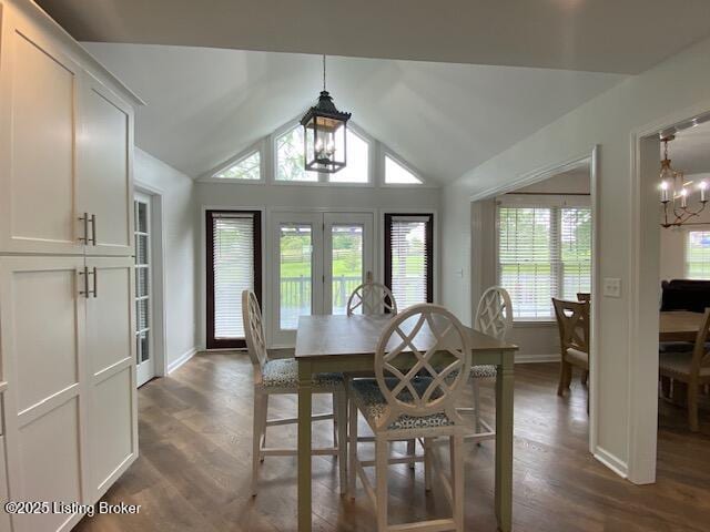 6780 Murrays Run Rd, Coxs Creek, KY 40013 - dining area with baseboards, dark wood-style flooring, vaulted ceiling, and a chandelier
