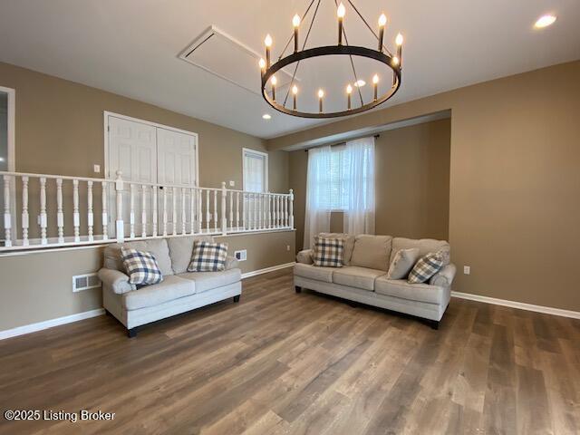 6780 Murrays Run Rd, Coxs Creek, KY 40013 - living area with wood finished floors, baseboards, a chandelier, and recessed lighting