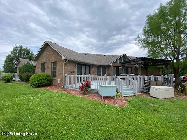 6780 Murrays Run Rd, Coxs Creek, KY 40013 - back of property with a pergola, a wooden deck, brick siding, and a yard
