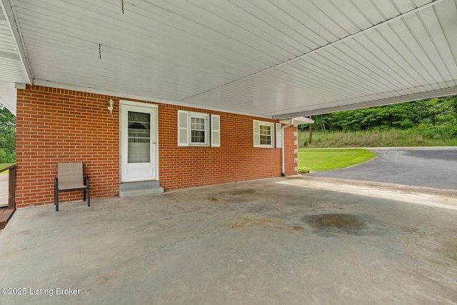 2200 Anneta Rd, Leitchfield, KY 42754 - view of patio with an attached carport and entry steps