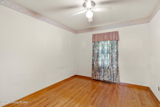 2200 Anneta Rd, Leitchfield, KY 42754 - empty room with a ceiling fan, light wood-style flooring, and baseboards