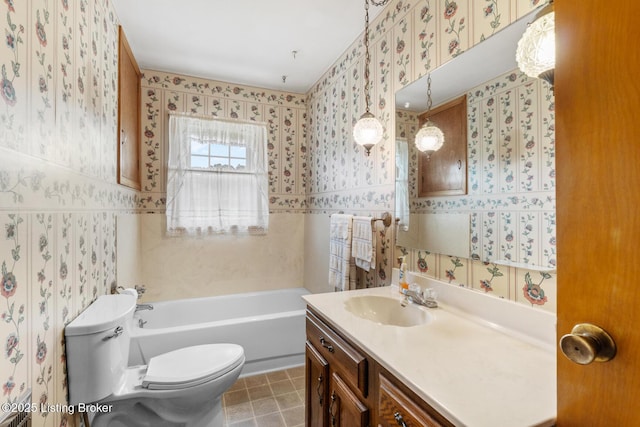2200 Anneta Rd, Leitchfield, KY 42754 - bathroom with toilet, a bathtub, vanity, wallpapered walls, and tile walls