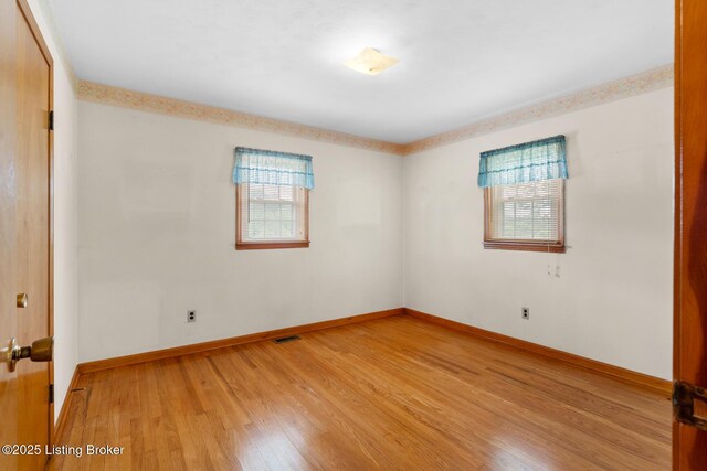 2200 Anneta Rd, Leitchfield, KY 42754 - unfurnished room with light wood-style floors and baseboards