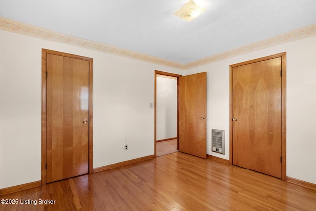 2200 Anneta Rd, Leitchfield, KY 42754 - unfurnished bedroom with light wood-style floors and baseboards