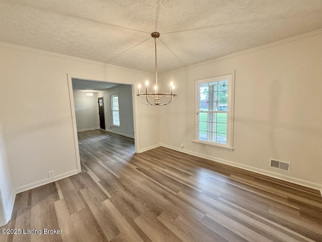 4813 Fox Chase Dr, Shepherdsville, KY 40165 - unfurnished dining area with a chandelier, dark wood-style flooring, healthy amount of natural light, a textured ceiling, and baseboards