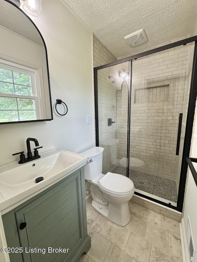 4813 Fox Chase Dr, Shepherdsville, KY 40165 - full bath featuring toilet, vanity, a stall shower, and a textured ceiling