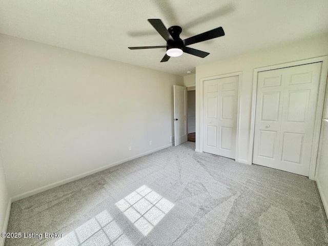 4813 Fox Chase Dr, Shepherdsville, KY 40165 - unfurnished bedroom with carpet flooring, baseboards, multiple closets, and a ceiling fan