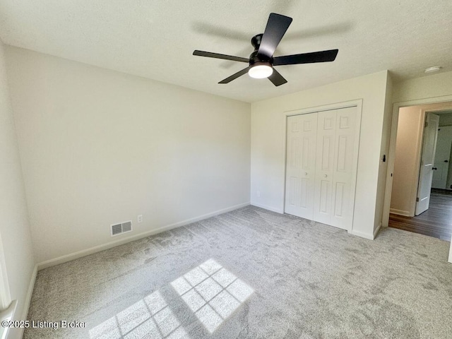 4813 Fox Chase Dr, Shepherdsville, KY 40165 - unfurnished bedroom featuring carpet, baseboards, a closet, and a textured ceiling