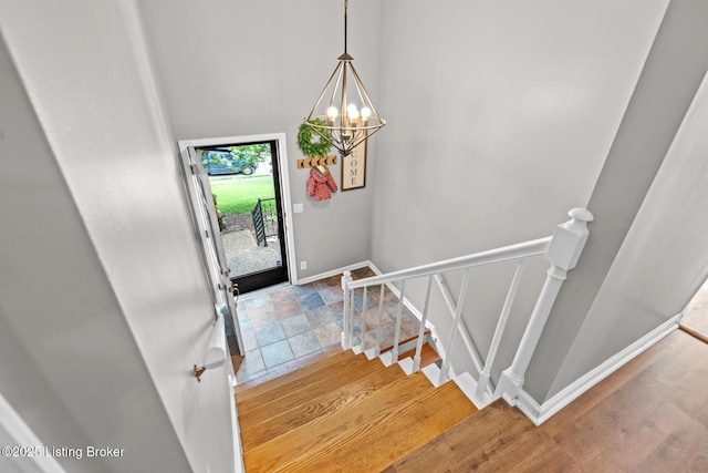 4211 Machupe Dr, Louisville, KY 40241 - foyer entrance with a chandelier, baseboards, and wood finished floors