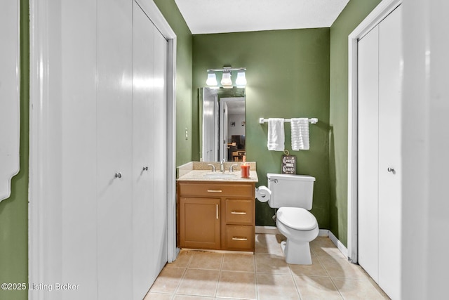 4211 Machupe Dr, Louisville, KY 40241 - bathroom featuring tile patterned floors, toilet, vanity, and baseboards