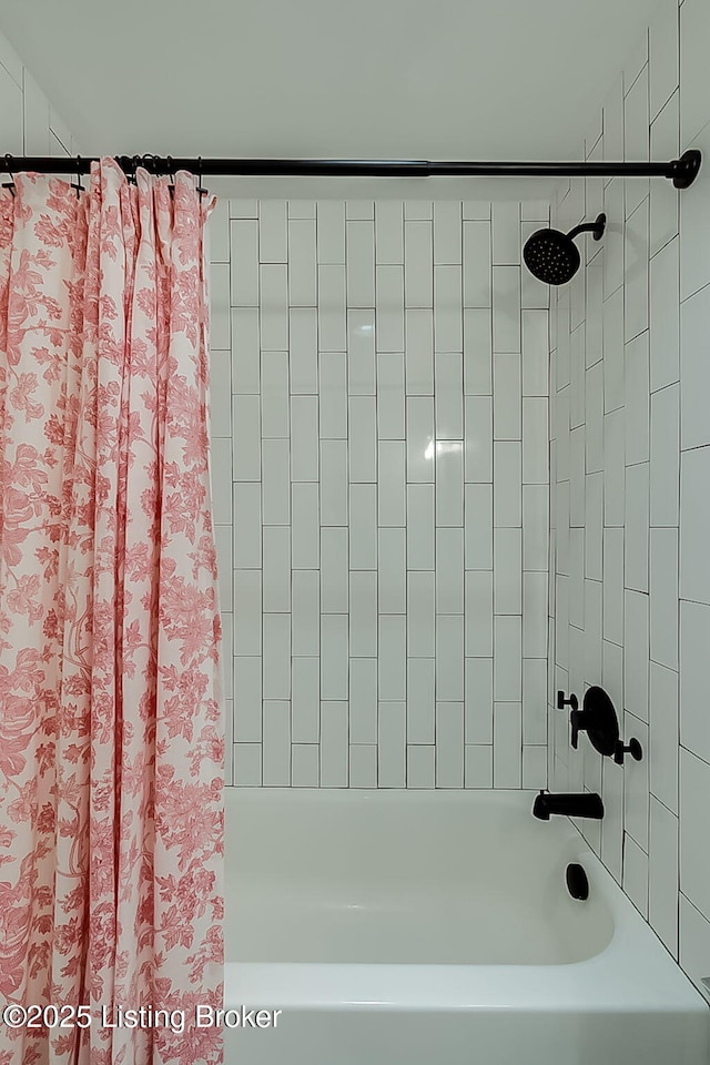 full bathroom featuring shower / bath combination with curtain