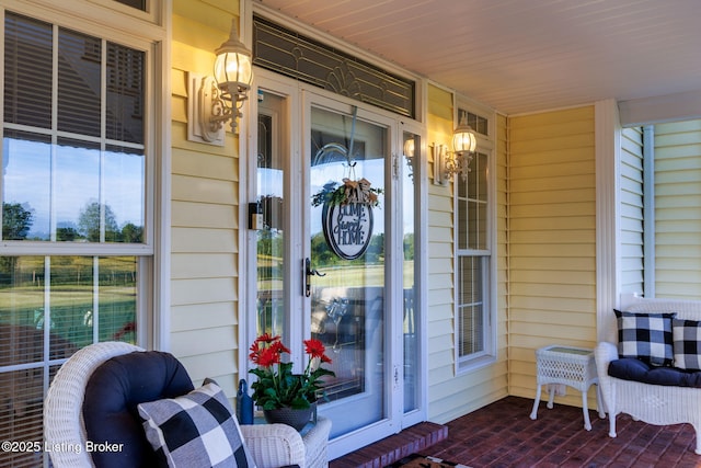 property entrance with covered porch