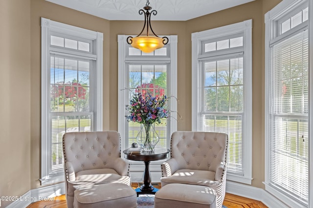 sitting room featuring baseboards